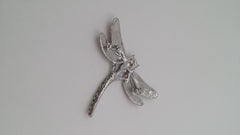 Back side of dragon fly broach