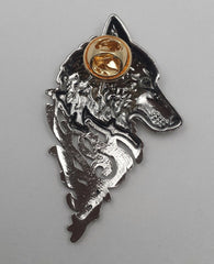 back of silver wolf pin