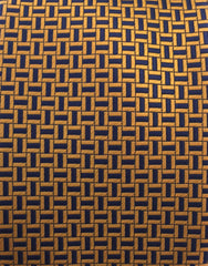 copper and navy blue tie close up