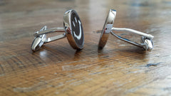 Smiley face cuff links