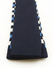 Back view of blue, black and white knit tie