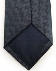 Tip of Gray herringbone tie