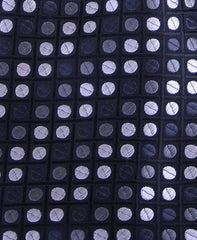 close up black, charcoal and silver dot tie