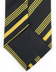 tip of black gold tie