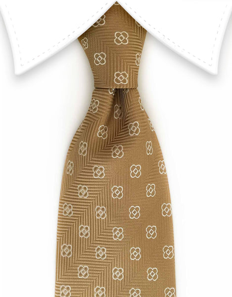 gold tie with white flower motif