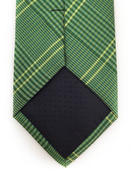 tip of green plaid tie