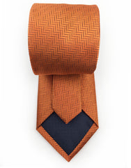 tip of orange herringbone necktie