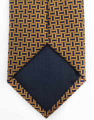 tip of orange and navy blue necktie