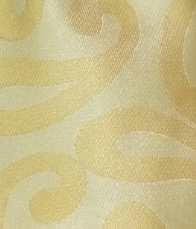 Soft yellow paisley tie close up