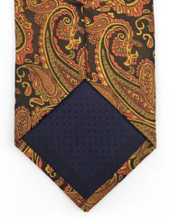 tip of orange paisley tie
